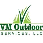 Logo for VM Outdoor services with grass